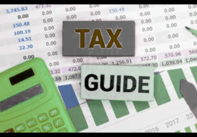 CFO reviewing tax documents and financial reports during tax season preparation